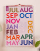 spiral bound mid-year calendar with a bold and colorful design