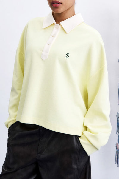 polo-style long sleeve top in pale butter yellow