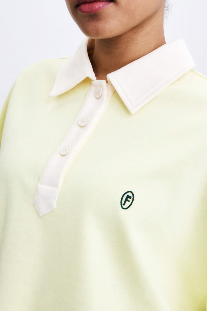 polo-style long sleeve top in pale butter yellow