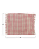 boucle throw blanket in a pink plaid pattern