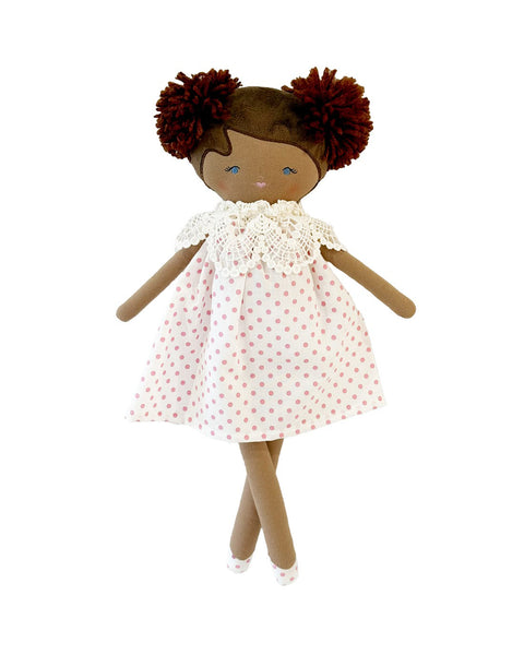 aggie doll with a berry pink polka dot dress