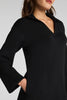 airessentials long sleeve polo dress in very black from spanx