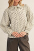 lightweight button down top in ivory with black polka dots throughout