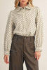 lightweight button down top in ivory with black polka dots throughout