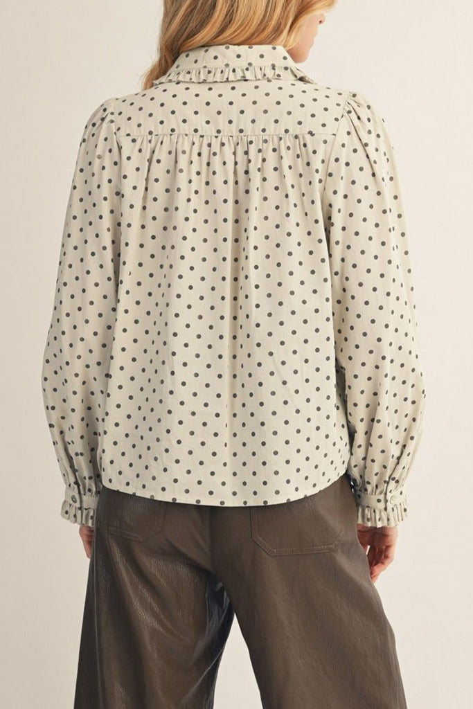lightweight button down top in ivory with black polka dots throughout
