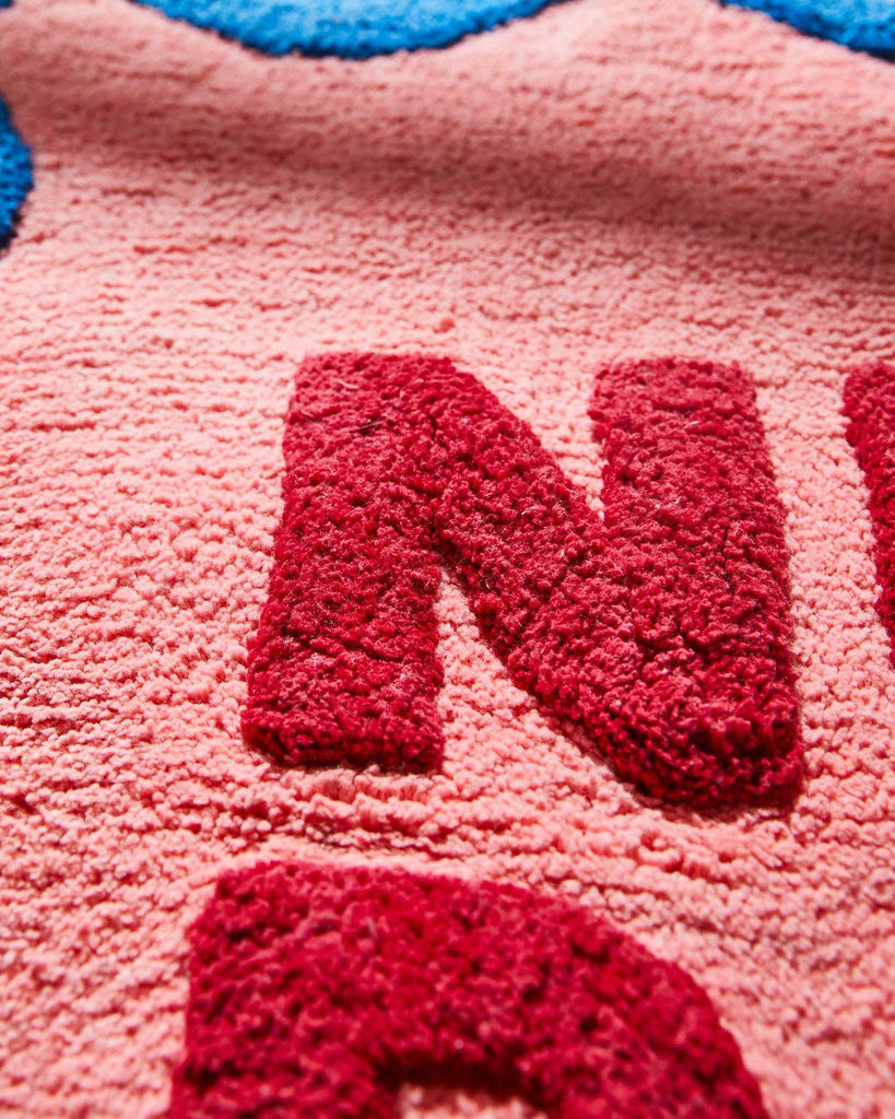 Amalie Nudie Bath Mat in hibiscus pink