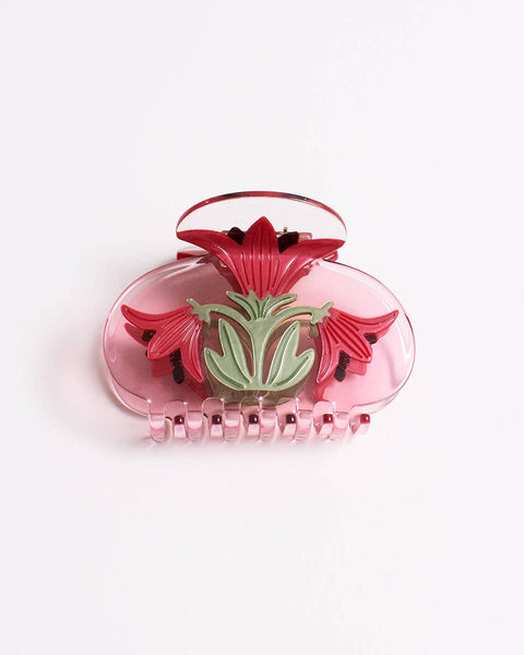 hair claw featuring a blooming red amaryllis