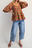babydoll style top in a colorful plaid pattern