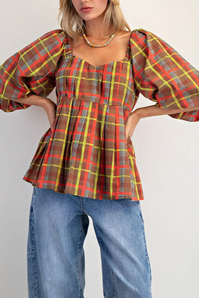 babydoll style top in a colorful plaid pattern