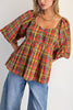 babydoll style top in a colorful plaid pattern