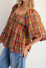 babydoll style top in a colorful plaid pattern