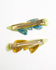 beautifully made hair clips in the shape of shimmering arowana fish