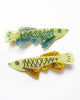 beautifully made hair clips in the shape of shimmering arowana fish