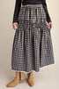 black and white plaid maxi skirt with smocked details and white lace trim. 