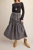 black and white plaid maxi skirt with smocked details and white lace trim. 