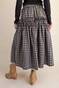 black and white plaid maxi skirt with smocked details and white lace trim. 