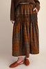 brown and black plaid maxi skirt with smocked details and lace trim