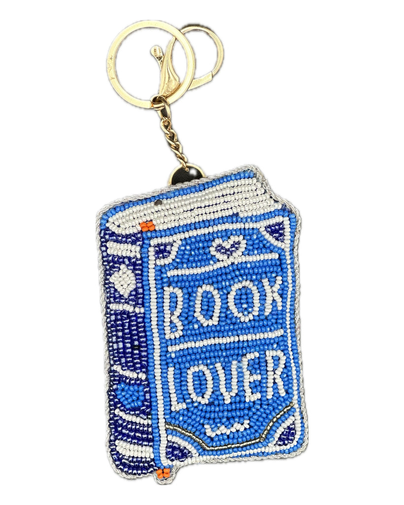 beaded bag charm in the shape of a book with the message book lover