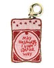 beaded bag charm in the shape of a matchbox with the message "may the bridges I burn light the way"