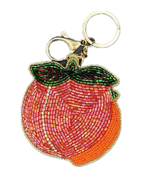beaded bag charm in the shape of a peach