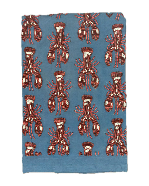 beaded towel with a red lobster design
