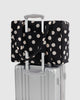small cloud carry-on bag in black and cream polka dot from baggu