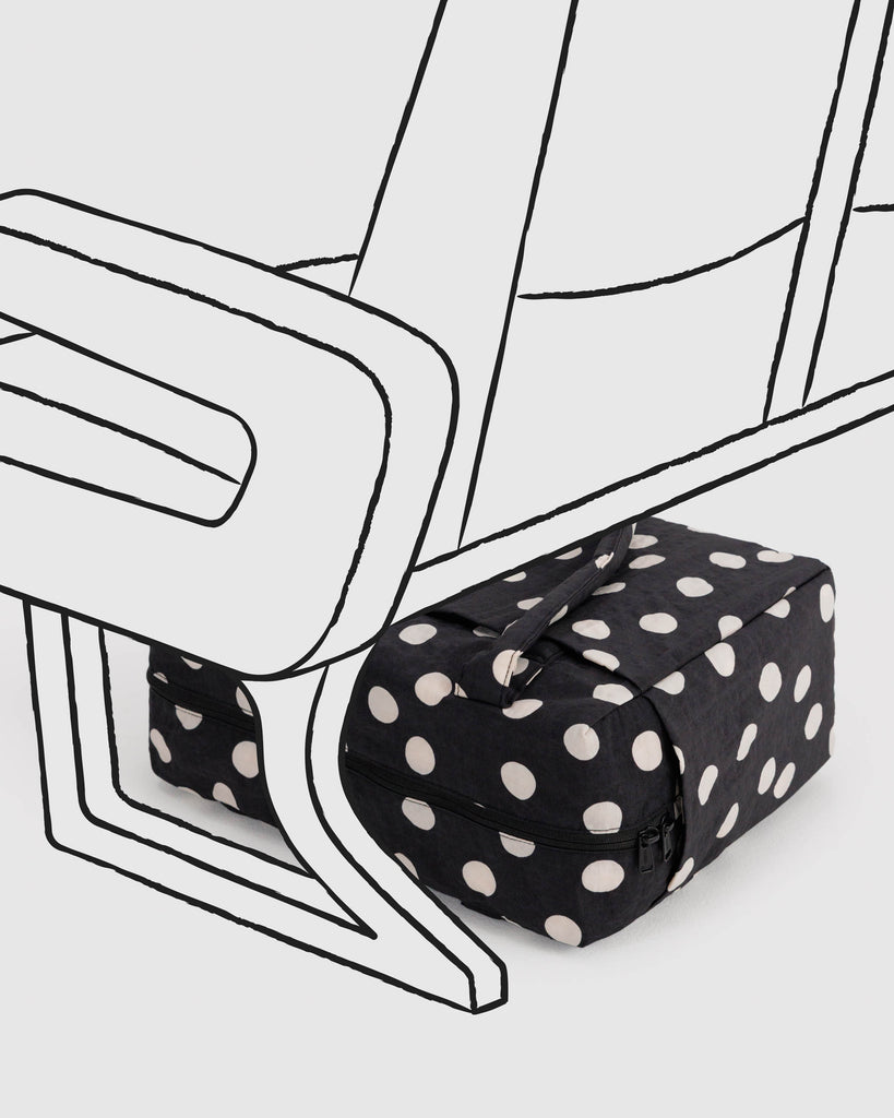 small cloud carry-on bag in black and cream polka dot from baggu