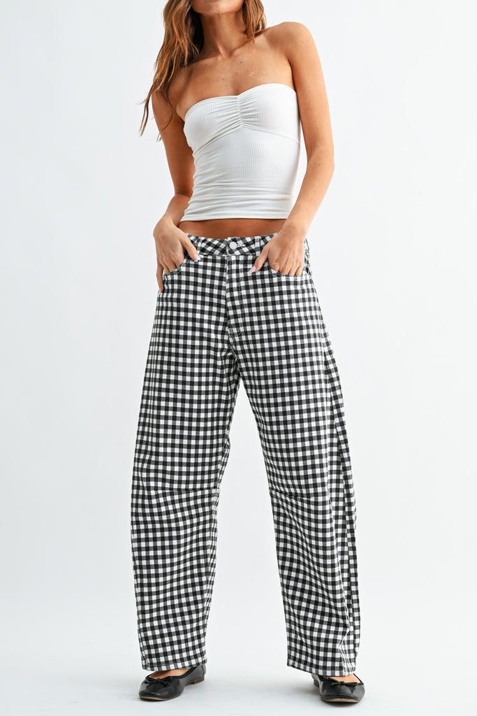 barrel leg jeans in a classic black and white gingham plaid.