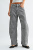 barrel leg jeans in a classic black and white gingham plaid.