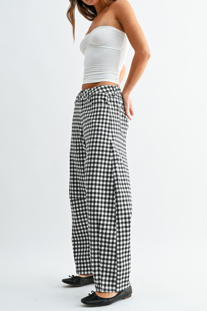 barrel leg jeans in a classic black and white gingham plaid.