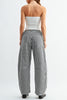 barrel leg jeans in a classic black and white gingham plaid.