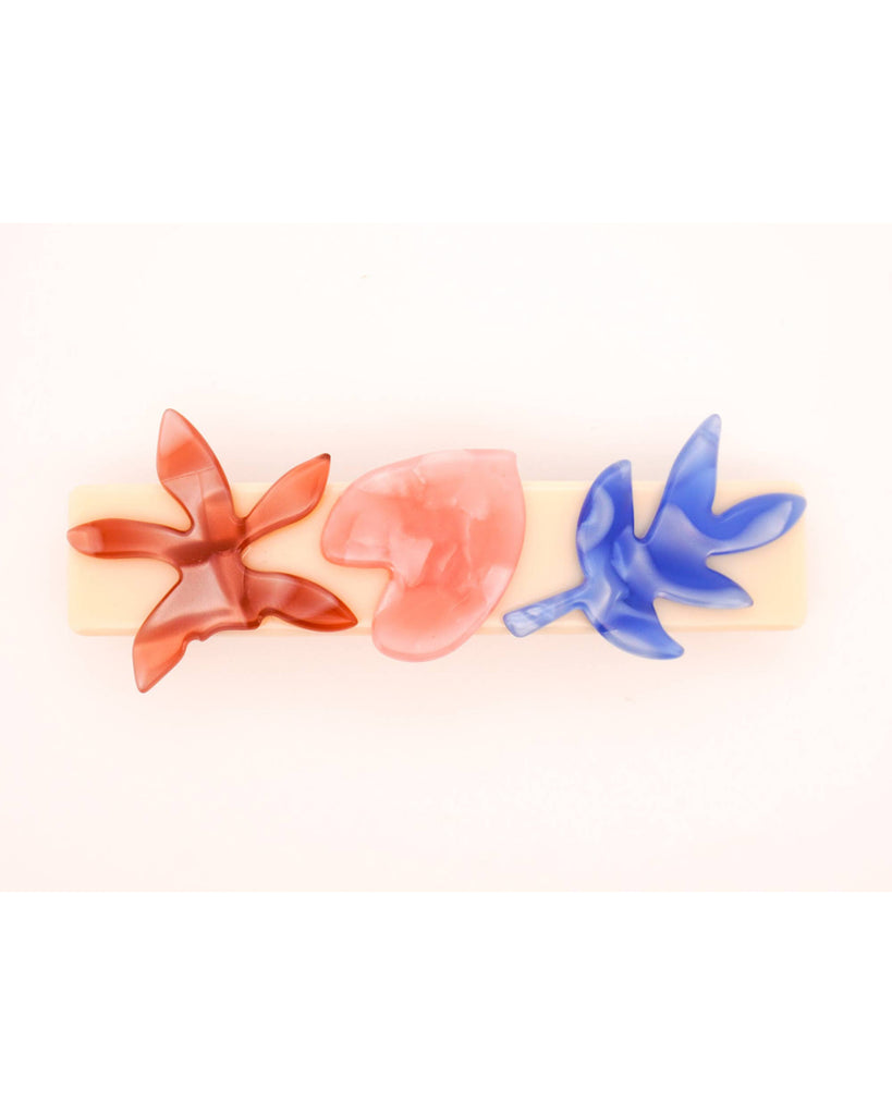 french barrette with striking flowers made from cellulose acetate