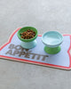 cute absorbent mat for a pet's water bowl