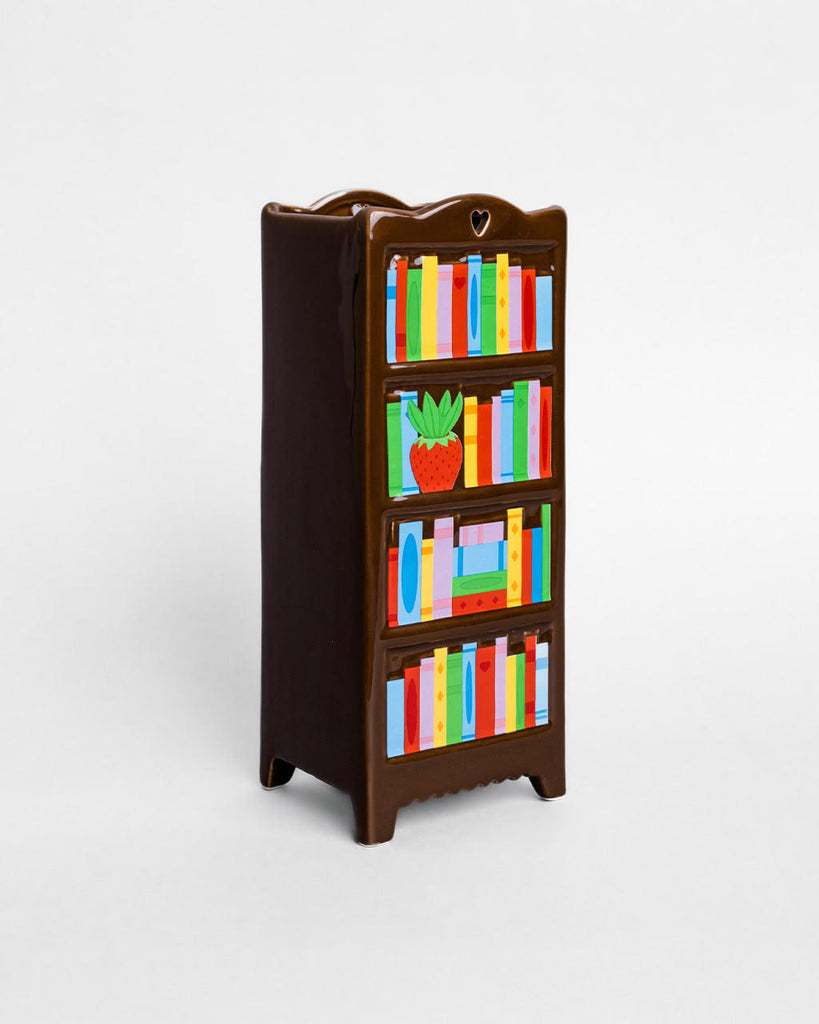 novelty ceramic vase in the shape of a bookshelf