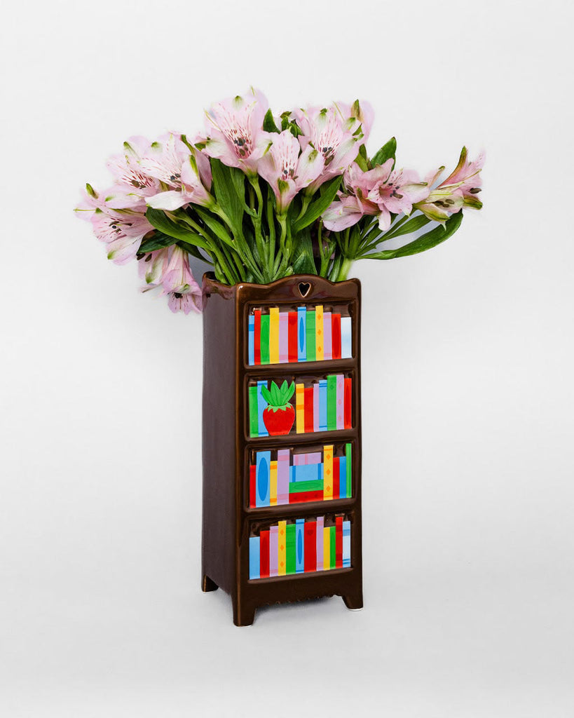 novelty ceramic vase in the shape of a bookshelf
