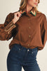 chocolate brown button down top with embroidered details on collar and wrist cuffs