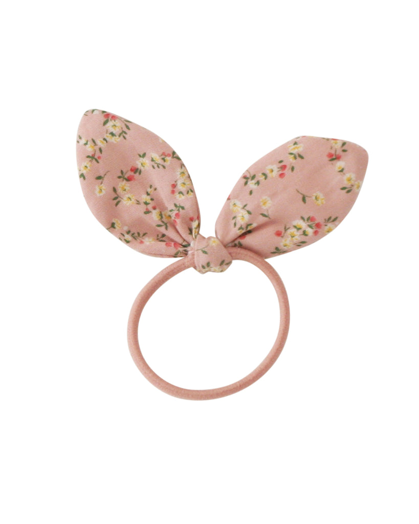 hair tie set with distinct bunny ear shaped bow in a pink floral pattern 