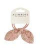 hair tie set with distinct bunny ear shaped bow in a pink floral pattern 