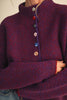 marled burgundy and pink button down sweater with colorful button detailing