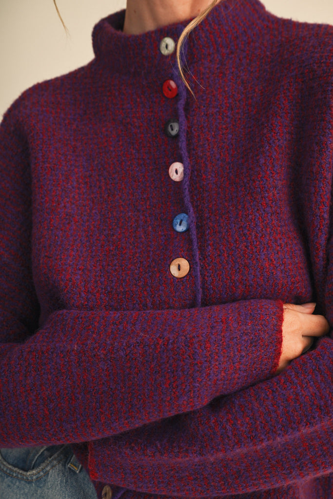 marled burgundy and pink button down sweater with colorful button detailing