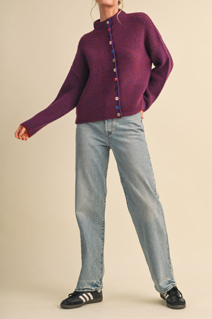 marled burgundy and pink button down sweater with colorful button detailing