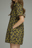 olive green mini dress with a subtle butterfly print in washed black