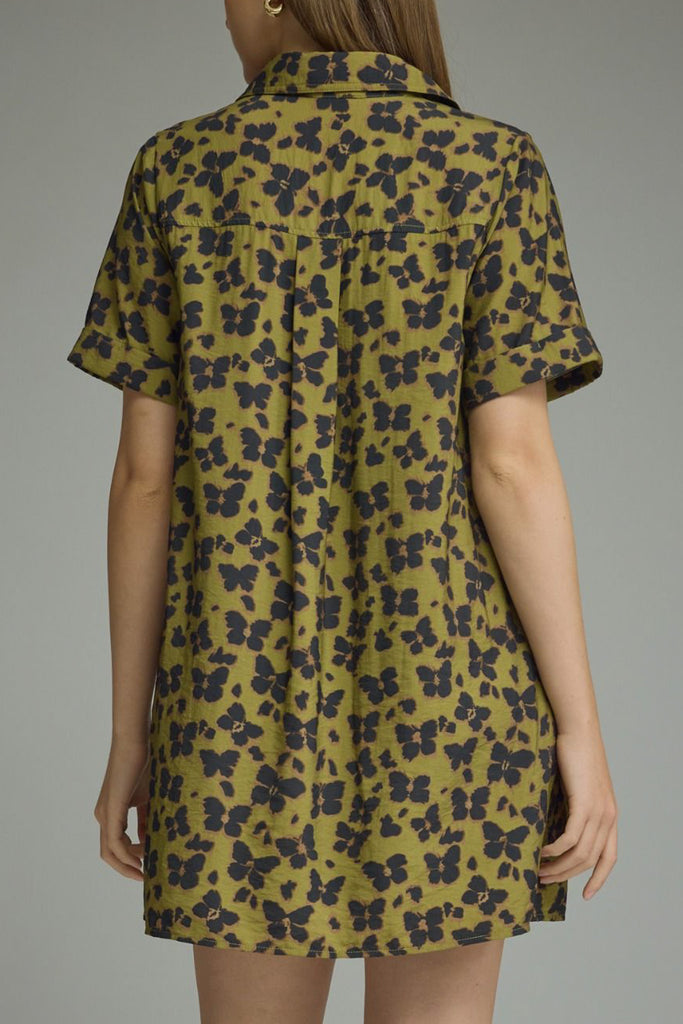 olive green mini dress with a subtle butterfly print in washed black
