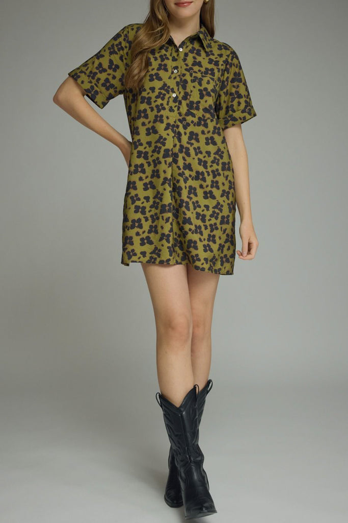 olive green mini dress with a subtle butterfly print in washed black