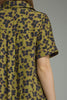 olive green mini dress with a subtle butterfly print in washed black