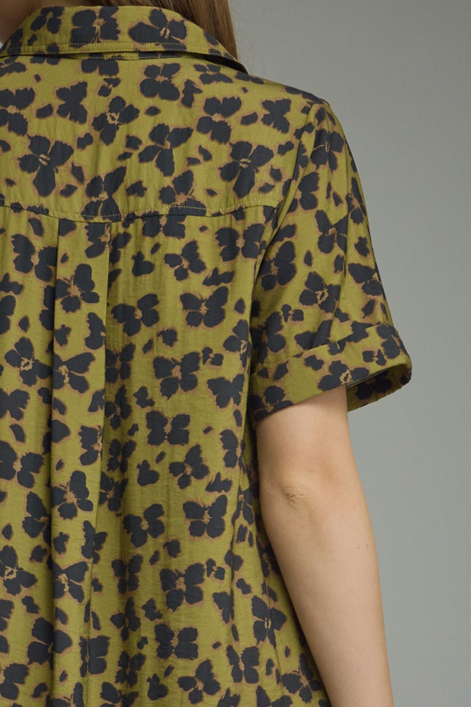 olive green mini dress with a subtle butterfly print in washed black