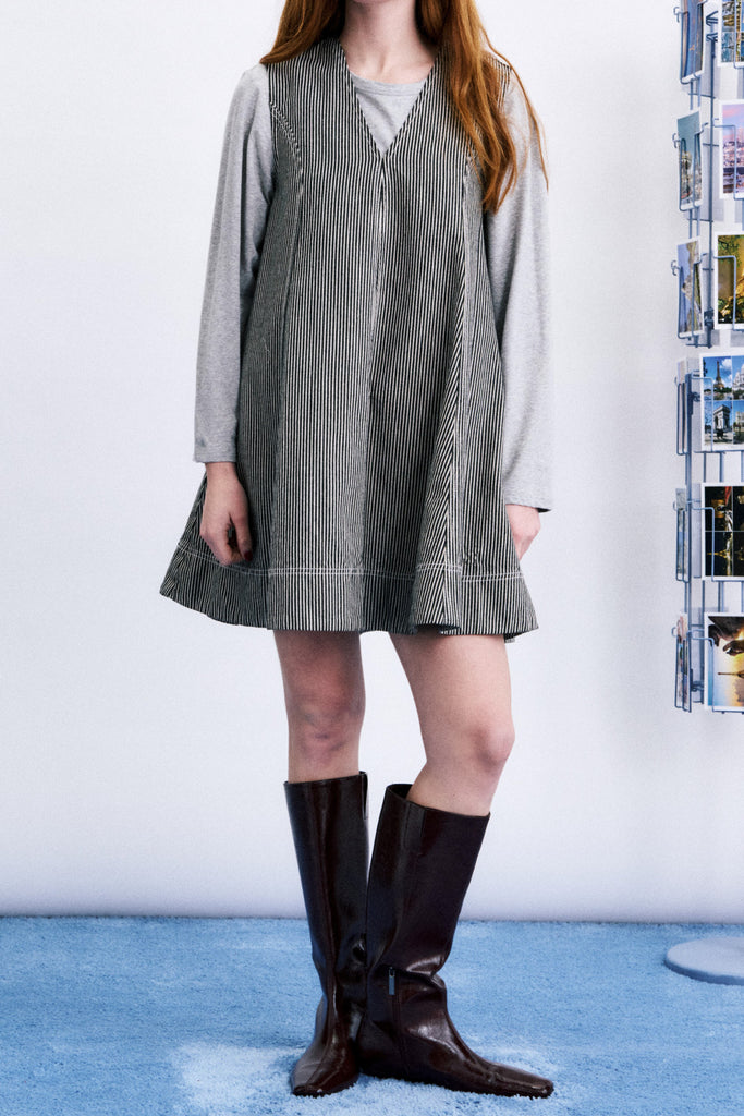 denim mini dress in charcoal grey and white vertical stripes.
