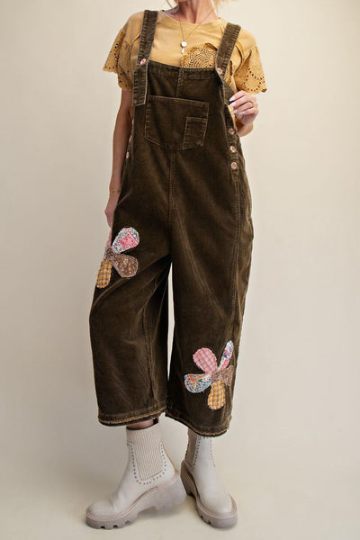 oversized olive green corduroy overalls with patchwork flower applique details 