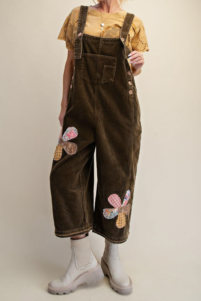 oversized olive green corduroy overalls with patchwork flower applique details 
