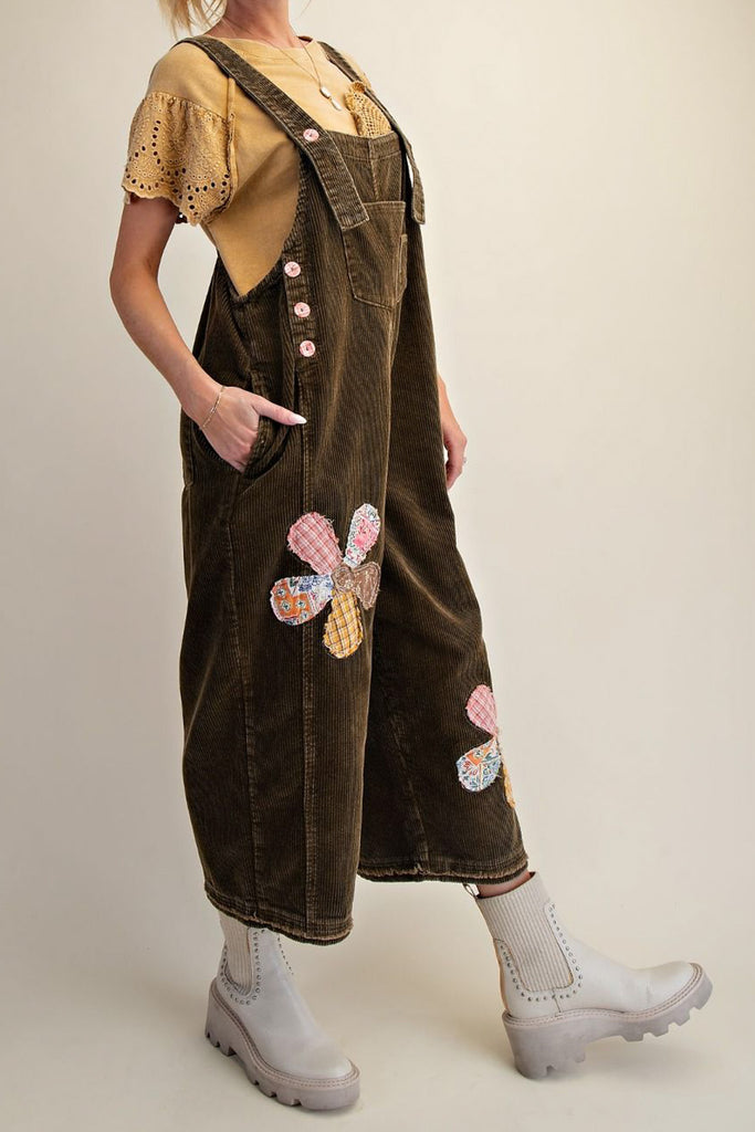 oversized olive green corduroy overalls with patchwork flower applique details 